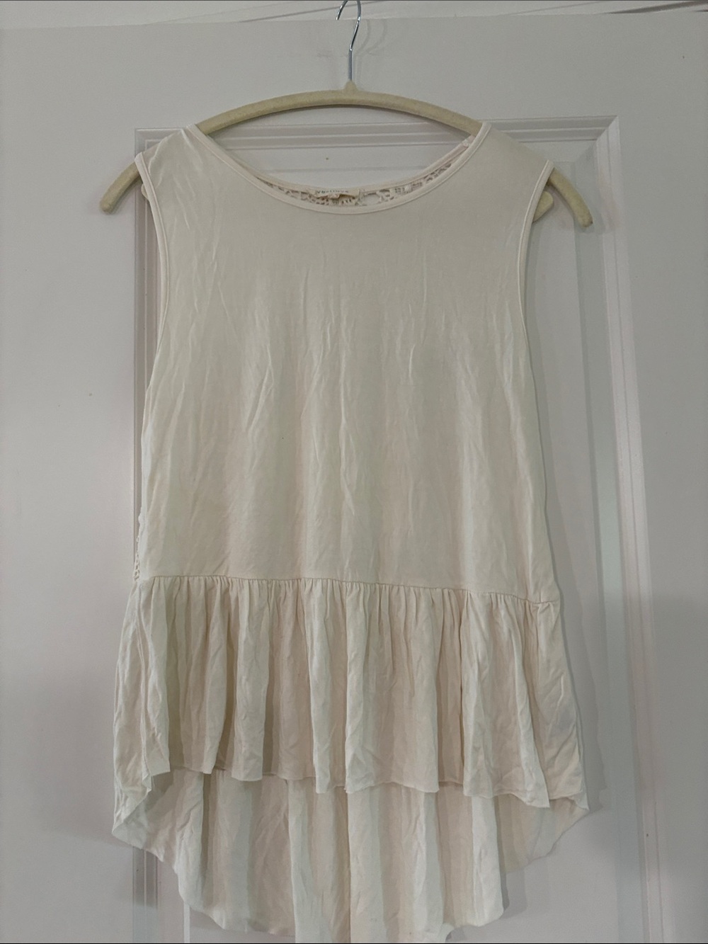 vestique Cream Sleeveless Ruffle-Hem Tunic